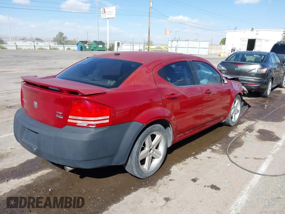 2008 Dodge Avenger SXT with VIN 1B3LC56R98N169618, listed as a IAAI auction lot 40626545 with 153,921 mi miles. Bid and sale history available at carsss.com. Image 4.