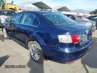 2014 Volkswagen Jetta TDI w/Premium with VIN 3VW3L7AJ7EM367323, listed as a IAAI auction lot 41419079 with 166,511 mi miles and . Bid and sale history available at DreamBid. Image 3.