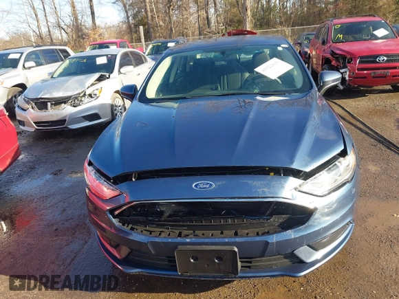 2018 Ford Fusion Hybrid SE with VIN 3FA6P0LU8JR229795, listed as a IAAI auction lot 41522818 with 115,420 mi miles. Bid and sale history available at carsss.com. Image 12.