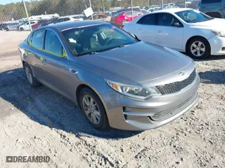 2018 Kia Optima S with VIN 5XXGT4L39JG192313, listed as a IAAI auction lot 41260143 with 138,413 mi miles. Bid and sale history available at carsss.com. Image 1.