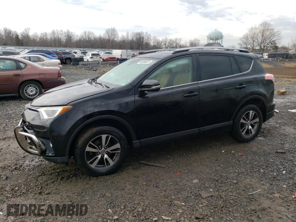 2018 Toyota RAV4 XLE with VIN 2T3RFREV6JW735352, listed as a Copart auction lot 46938025 with 73,229 mi miles and Salvage title. Bid and sale history available at DreamBid. Image 1.