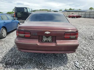 1991 Chevrolet Caprice z VIN 1G1BN53E9MW187619, wystawiony jako Copart lot #55291845 z przebiegiem 1 433 530 mil mil oraz Szkody całkowita. Historia ofert i sprzedaży dostępna na DreamBid. Obrazek 6.