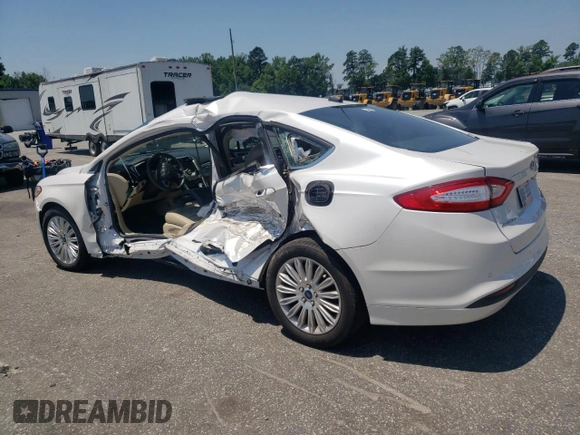 2015 Ford Fusion SE Hybrid z VIN 3FA6P0LU8FR105615, wystawiony jako Copart lot #61451155 z przebiegiem 106 778 mil mil oraz Szkoda całkowita • Salvage title. Historia ofert i sprzedaży dostępna na DreamBid. Obrazek 2.