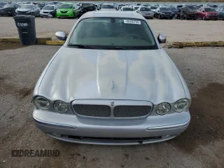 2004 Jaguar XJ with VIN SAJWA73B14TG24590, listed as a Copart auction lot 48438705 with 197,113 mi miles and Clean Title. Bid and sale history available at carsss.com. Image 5.