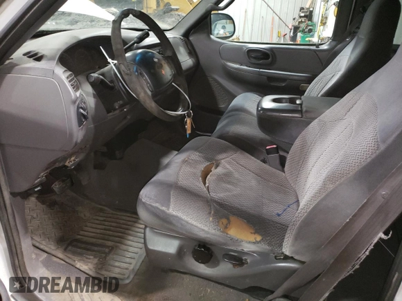 1999 Ford F-150 XL с VIN 1FTRX18LXXKA69025, выставлен на аукционе Copart как лот 57625035 с пробегом Не указан миль и На запчасти • Non repairable. История ставок и продаж доступна на DreamBid. Изображение 7.