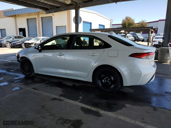 2020 Toyota Corolla Hybrid LE with VIN JTDEBRBE8LJ000680, listed as a Copart auction lot 52018565 with 57,982 mi miles and Salvage Title. Bid and sale history available at carsss.com. Image 2.