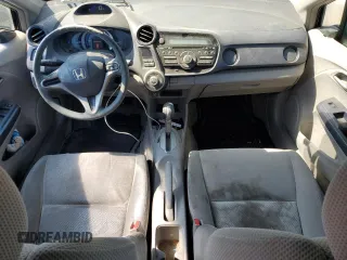 2010 Honda Insight LX with VIN JHMZE2H59AS041185, listed as a Copart auction lot 64517415 with 208,242 mi miles and Salvage title. Bid and sale history available at DreamBid. Image 8.