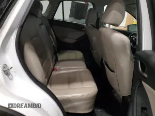 2014 Mazda CX-5 Grand Touring with VIN JM3KE4DY9E0343616, listed as a Copart auction lot 46427715 with 205,325 mi miles and Salvage Title. Bid and sale history available at carsss.com. Image 11.