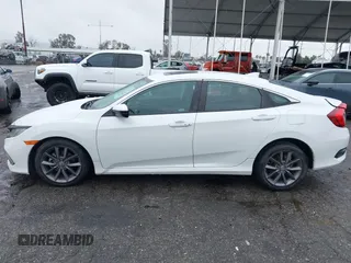 2021 Honda Civic Sedan EX-L with VIN 19XFC1F77ME205128, listed as a IAAI auction lot 41562202 with 82,257 mi miles. Bid and sale history available at carsss.com. Image 14.