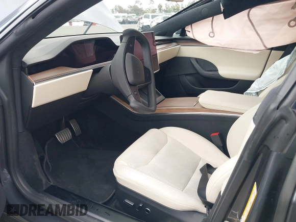 2021 Tesla Model S Long Range с VIN 5YJSA1E57MF441387, выставлен на аукционе IAAI как лот 42034307 с пробегом Не указан миль и . История ставок и продаж доступна на DreamBid. Изображение 5.