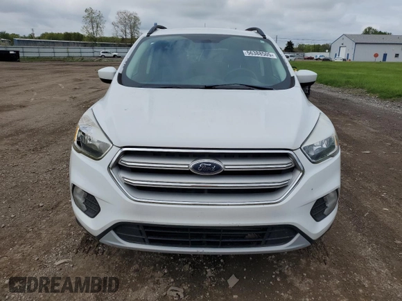 2018 Ford Escape SE z VIN 1FMCU9G97JUB48596, wystawiony jako Copart lot #56388505 z przebiegiem 96 996 mil mil oraz Czysty tytuł • Clean title. Historia ofert i sprzedaży dostępna na DreamBid. Obrazek 5.