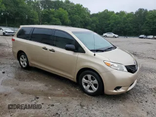 2014 Toyota Sienna L with VIN 5TDZK3DC3ES499663, listed as a Copart auction lot 57615535 with 201,561 mi miles and Salvage title. Bid and sale history available at DreamBid. Image 4.
