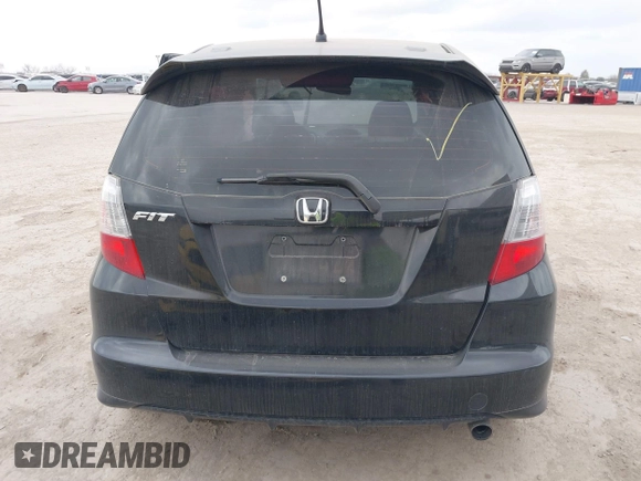 2009 Honda Fit Sport with VIN JHMGE88499S027610, listed as a IAAI auction lot 41712904 with 147,069 mi miles. Bid and sale history available at carsss.com. Image 16.