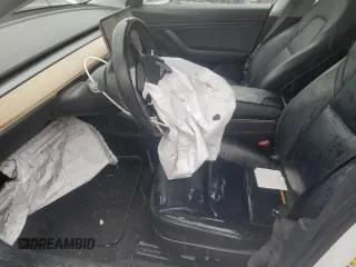 2020 Tesla Model 3 Performance z VIN 5YJ3E1EC9LF784594, wystawiony jako Copart lot #56179955 z przebiegiem 97 419 mil mil oraz Szkoda całkowita • Salvage title. Historia ofert i sprzedaży dostępna na DreamBid. Obrazek 7.