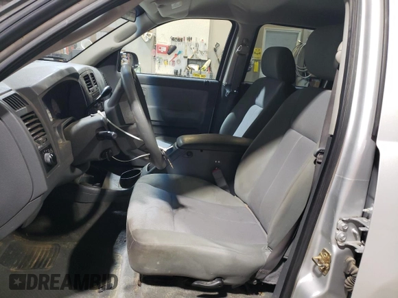 2006 Dodge Dakota ST with VIN 1D7HW28N46S634573, listed as a Copart auction lot 43834355 with 158,343 mi miles and Salvage Title. Bid and sale history available at DreamBid. Image 7.