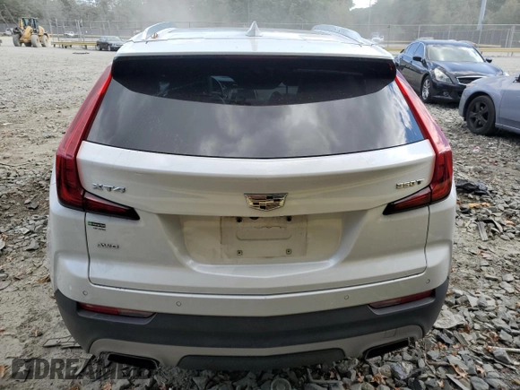 2020 Cadillac XT4 AWD Premium Luxury with VIN 1GYFZDR40LF086211, listed as a Copart auction lot 75734134 with 75,275 mi miles and Salvage title. Bid and sale history available at DreamBid. Image 6.