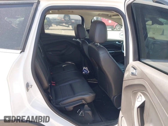 2015 Ford Escape Titanium with VIN 1FMCU0JX4FUB07322, listed as a IAAI auction lot 42220345 with 184,852 mi miles and . Bid and sale history available at DreamBid. Image 8.