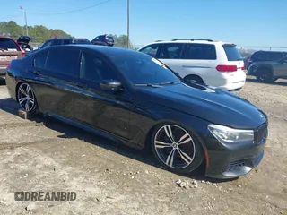 2016 BMW 7 Series 740i with VIN WBA7E2C5XGG738891, listed as a IAAI auction lot 41669578 with 106,673 mi miles and . Bid and sale history available at DreamBid. Image 1.