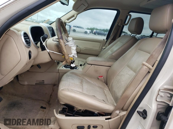 2006 Mercury Mountaineer Luxury with VIN 4M2EU37E76UJ26560, listed as a Copart auction lot 61408055 with 155,032 mi miles and Salvage title. Bid and sale history available at DreamBid. Image 7.