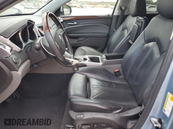2011 Cadillac SRX Premium Collection with VIN 3GYFNFEY3BS585014, listed as a Copart auction lot 63872065 with 140,680 mi miles and Salvage title. Bid and sale history available at DreamBid. Image 7.