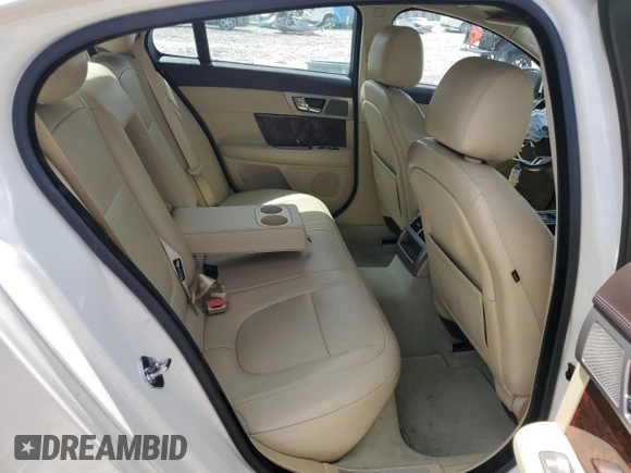 2009 Jaguar XF with VIN SAJXA06B79HR44382, listed as a Copart auction lot 53041205 with 121,245 mi miles and Salvage Title. Bid and sale history available at DreamBid. Image 10.