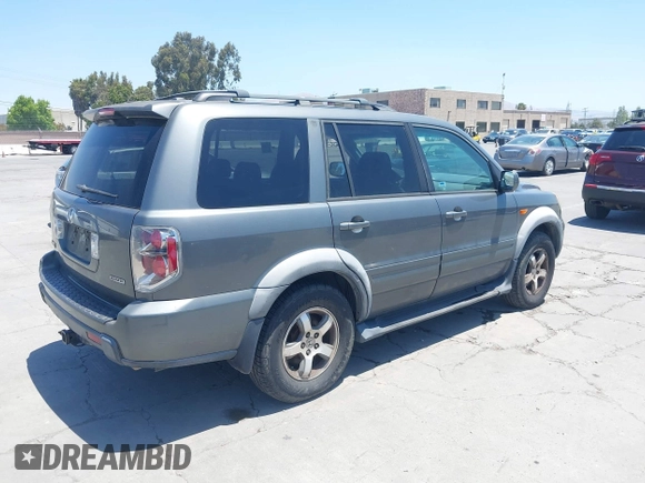 2007 Honda Pilot EX-L with VIN 5FNYF18587B015655, listed as a IAAI auction lot 42485193 with 293,684 mi miles and . Bid and sale history available at DreamBid. Image 4.
