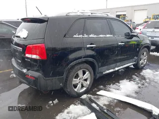 2012 Kia Sorento EX with VIN 5XYKUDA2XCG301636, listed as a IAAI auction lot 41619793 with 220,692 mi miles. Bid and sale history available at carsss.com. Image 4.