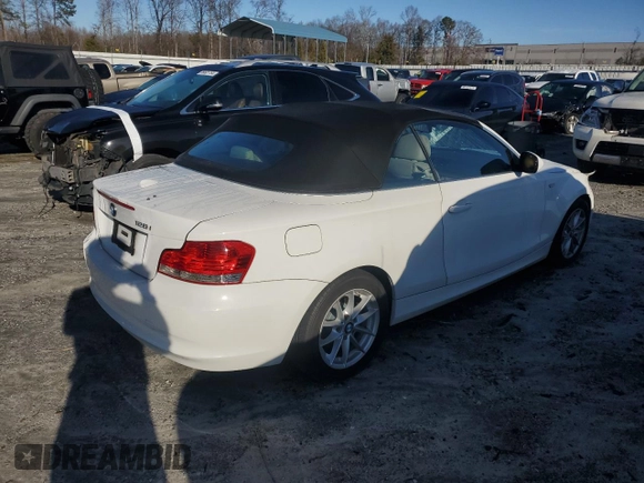 2011 BMW 1 Series 128i with VIN WBAUN1C53BVH82638, listed as a Copart auction lot 85823794 with 137,142 mi miles and Salvage title. Bid and sale history available at DreamBid. Image 3.
