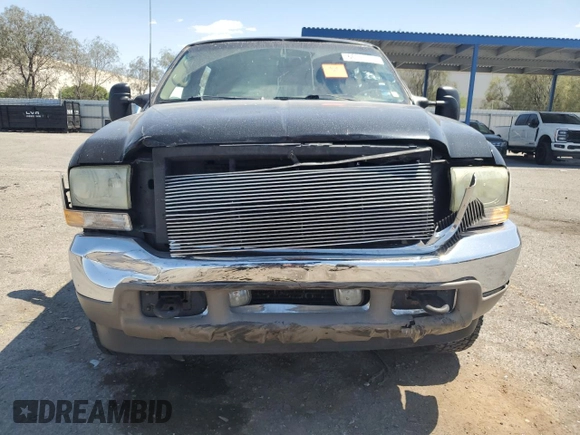 2002 Ford Excursion Limited z VIN 1FMNU43S92EC53835, wystawiony jako Copart lot #60525215 z przebiegiem 207 011 mil mil oraz Szkoda całkowita • Salvage title. Historia ofert i sprzedaży dostępna na DreamBid. Obrazek 5.