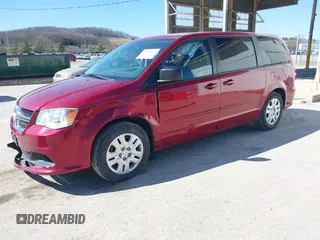 2015 Dodge Grand Caravan American Value with VIN 2C4RDGBG5FR524158, listed as a IAAI auction lot 41898743 with 80,023 mi miles and . Bid and sale history available at DreamBid. Image 2.