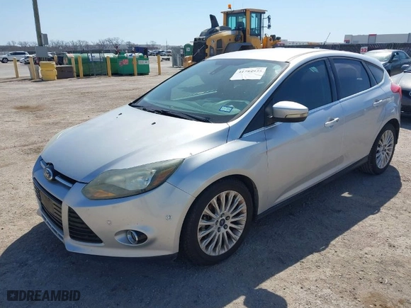 2012 Ford Focus Titanium with VIN 1FAHP3N20CL402944, listed as a IAAI auction lot 41784935 with NaN miles. Bid and sale history available at carsss.com. Image 6.