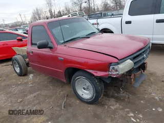 1996 Mazda B-Series 2WD Truck with VIN 4F4CR12A2TTM42030, listed as a IAAI auction lot 41414250 with 208,560 mi miles. Bid and sale history available at carsss.com. Image 1.