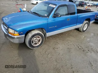 1999 Dodge Dakota SLT with VIN 1B7GL22X7XS121831, listed as a Copart auction lot 43424265 with 201,511 mi miles and Salvage Title. Bid and sale history available at carsss.com. Image 1.