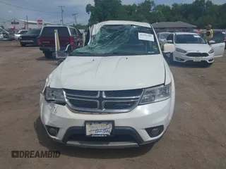 2017 Dodge Journey SXT z VIN 3C4PDCBG8HT534473, wystawiony jako IAAI lot #42351286 z przebiegiem 127 917 mil mil oraz . Historia ofert i sprzedaży dostępna na DreamBid. Obrazek 12.