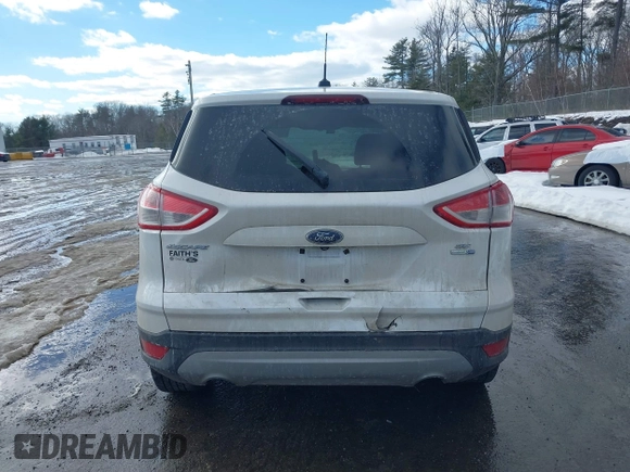 2014 Ford Escape SE with VIN 1FMCU9GX7EUD76778, listed as a IAAI auction lot 41679482 with 136,832 mi miles and . Bid and sale history available at carsss.com. Image 17.