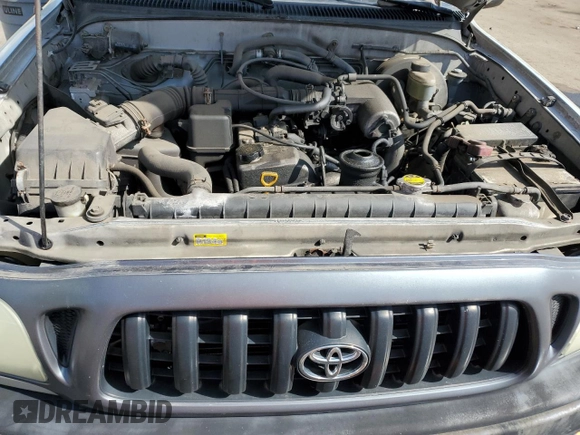 2003 Toyota Tacoma z VIN 5TENL42N73Z299388, wystawiony jako Copart lot #54872325 z przebiegiem 159 153 mil mil oraz Szkoda całkowita • Salvage title. Historia ofert i sprzedaży dostępna na DreamBid. Obrazek 11.