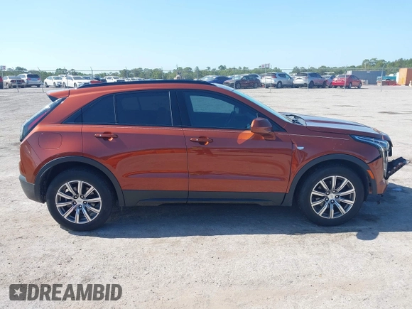 2019 Cadillac XT4 FWD Sport z VIN 1GYFZER4XKF103780, wystawiony jako IAAI lot #42171306 z przebiegiem 99 260 mil mil oraz . Historia ofert i sprzedaży dostępna na DreamBid. Obrazek 13.