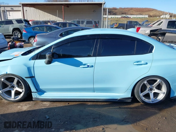 2016 Subaru WRX with VIN JF1VA1B61G9826975, listed as a IAAI auction lot 41511402 with 86,000 mi miles. Bid and sale history available at carsss.com. Image 14.