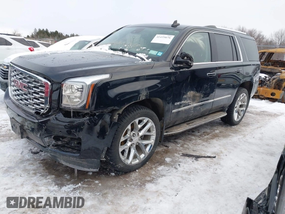 2020 GMC Yukon Denali with VIN 1GKS2CKJ5LR301216, listed as a IAAI auction lot 41439076 with 76,129 mi miles. Bid and sale history available at carsss.com. Image 17.