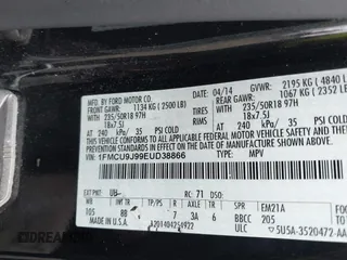 2014 Ford Escape Titanium with VIN 1FMCU9J99EUD38866, listed as a IAAI auction lot 42052579 with 202,337 mi miles. Bid and sale history available at carsss.com. Image 9.