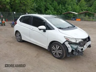 2016 Honda Fit EX z VIN JHMGK5H77GS004034, wystawiony jako IAAI lot #42364161 z przebiegiem 127 234 mil mil oraz . Historia ofert i sprzedaży dostępna na DreamBid. Obrazek 1.