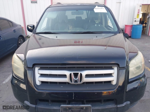 2006 Honda Pilot EX-L with RES with VIN 5FNYF28616B029670, listed as a IAAI auction lot 41425494 with 206,756 mi miles. Bid and sale history available at carsss.com. Image 12.