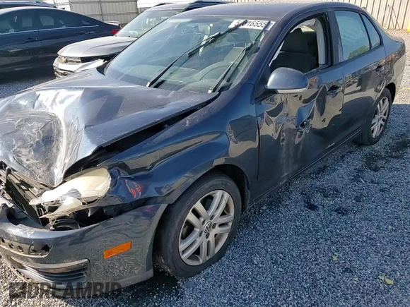 2009 Volkswagen Jetta S с VIN 3VWJM71K69M012386, выставлен на аукционе Copart как лот 52616555 с пробегом 150 322 миль миль и Списание • Salvage title. История ставок и продаж доступна на DreamBid. Изображение 11.