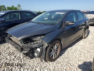 2016 Ford Focus SE z VIN 1FADP3F24GL405039, wystawiony jako Copart lot #60818955 z przebiegiem 197 201 mil mil oraz Szkoda całkowita • Salvage title. Historia ofert i sprzedaży dostępna na DreamBid. Obrazek 1.