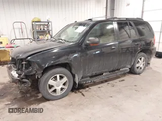 2005 GMC Envoy SLT with VIN 1GKDT13S452349125, listed as a IAAI auction lot 41148381 with 224,049 mi miles. Bid and sale history available at carsss.com. Image 2.