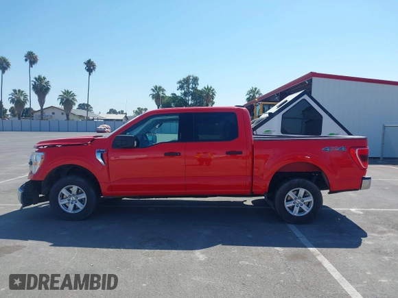 2021 Ford F-150 XL with VIN 1FTFW1E56MKD86209, listed as a IAAI auction lot 42700594 with 120,972 mi miles and . Bid and sale history available at DreamBid. Image 14.