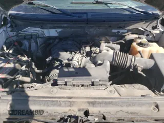 2011 Ford F-150 XL с VIN 1FTMF1CM7BKE20401, выставлен на аукционе Copart как лот 41052284 с пробегом 192 786 миль миль и Чистый • Clean title. История ставок и продаж доступна на DreamBid. Изображение 11.