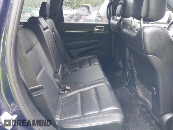 2018 Jeep Grand Cherokee Limited with VIN 1C4RJFBG8JC349148, listed as a IAAI auction lot 42451189 with 93,370 mi miles and . Bid and sale history available at DreamBid. Image 8.