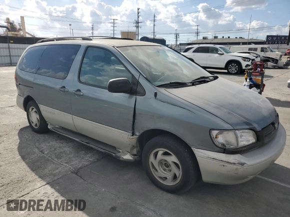 1999 Toyota Sienna LE with VIN 4T3ZF13C6XU128055, listed as a Copart auction lot 81100934 with 0 mi miles and Salvage Title. Bid and sale history available at carsss.com. Image 4.