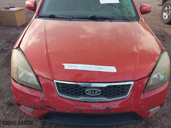 2011 Kia Rio LX with VIN KNADH4A33B6714471, listed as a IAAI auction lot 41970737 with 188,214 mi miles. Bid and sale history available at carsss.com. Image 10.